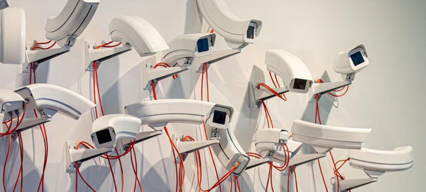 Jakub Geltner Bends Surveillance Cameras Into Curved Installations for Exhibition in Belgium